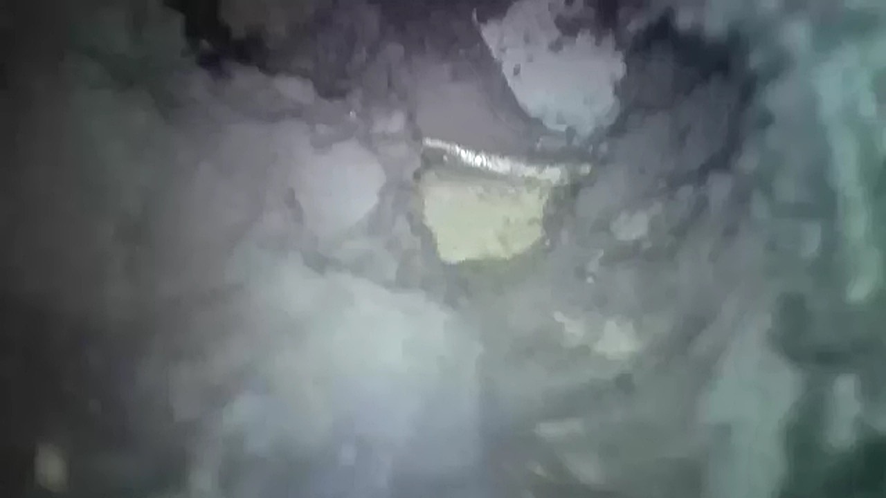 Dryer duct end buried in insulation within attic cavity